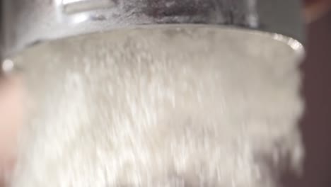 sifting flour and water spray