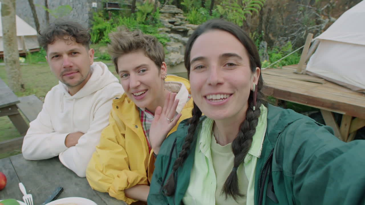 POV of Young Friends Chatting on Camera while Glamping
