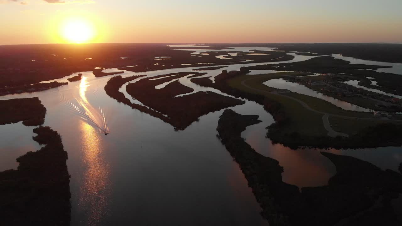 Aerial of boater coming home from a long day of fishing in Florida