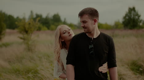 Joyful-Couple-Walking-And-Smiling-Outdoors-In-Summer-3