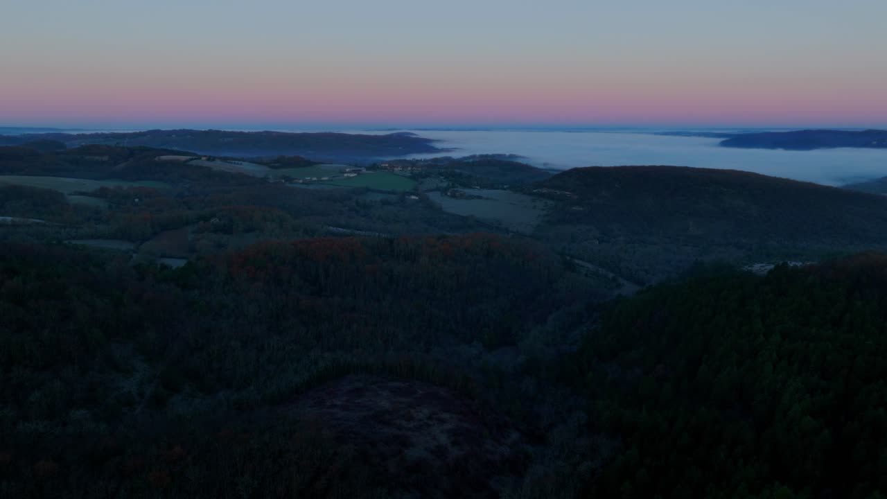Valley in mist at sunrise, magical landscape with mist