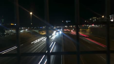 nighttime timelapse of a freeway in downtown denver colorado