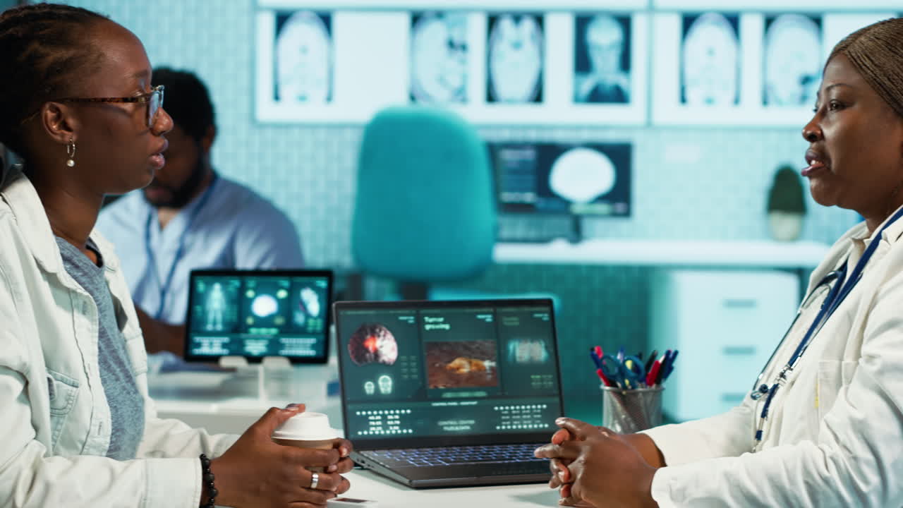 Female healthcare professional consulting a young girl patient