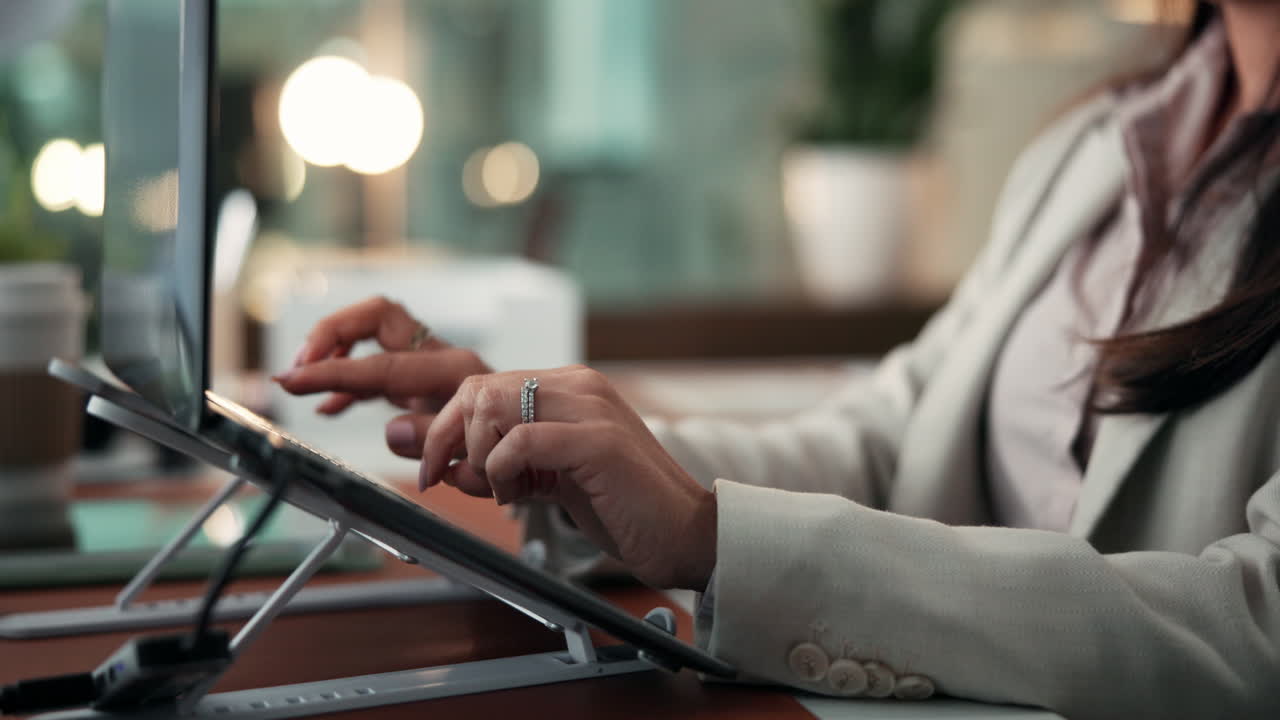 Woman typing on a laptop