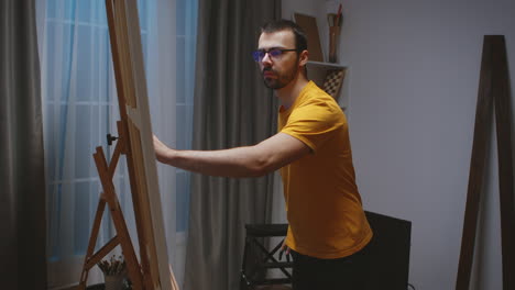 guy working on painting