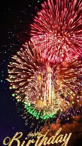 aerial video captures vibrant purple fireworks bursting in the night sky, with a 'happy birthday'