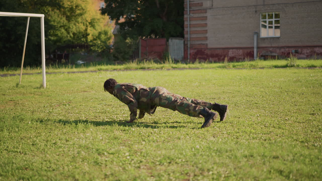 Service Member Finishes Outdoor Workout, Soldier Finishes Vigorous Outdoor Training Session Successfully, Military Serviceman Wraps Up Intense Physical Exercise Routine Outdoors Successfully