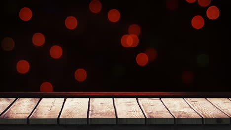 primer plano de madera con fondo de luces de navidad