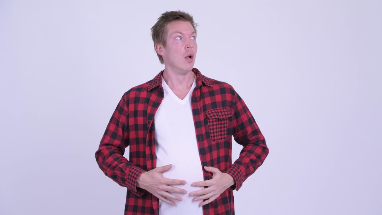 Young hipster man with big belly
