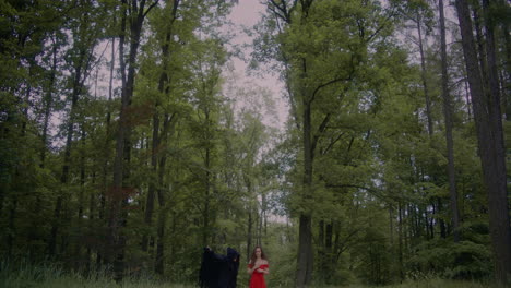 Reaper-Standing-Behind-Woman-Forest