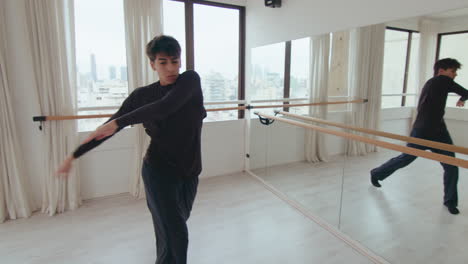 Creative Male Dancer Practicing Contemporary Style in front of Mirror Wall