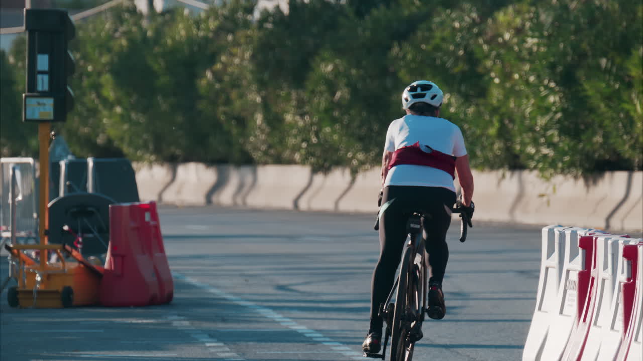 Man cycling on the streets of Vallauris, France in daylight