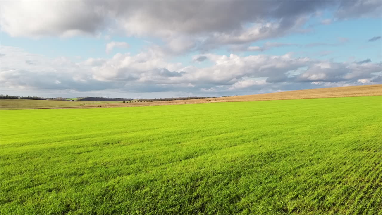 Aerial drone view of nature in Moldova. Green and yellow wide fields
