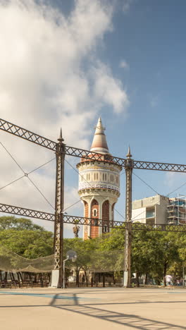 barcelona, spain - 31 august 2024 : timelpase of ornate old water tower in barcelona in vertical