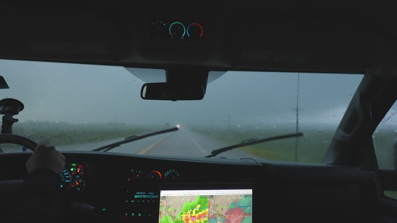 Passenger View Of Storm Chasers Driving In Heavy Rain Slow Motion