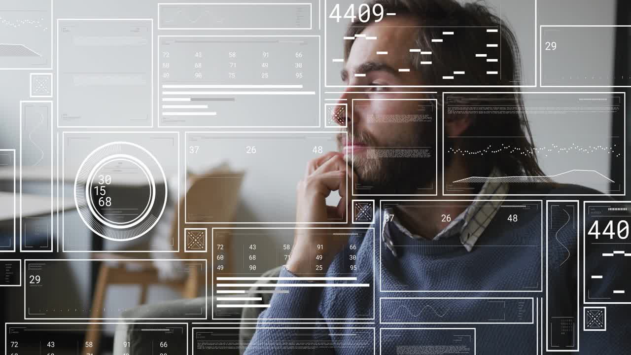 Bearded man on sofa monitoring tech data panels appearing and intensifying metrics for evaluation
