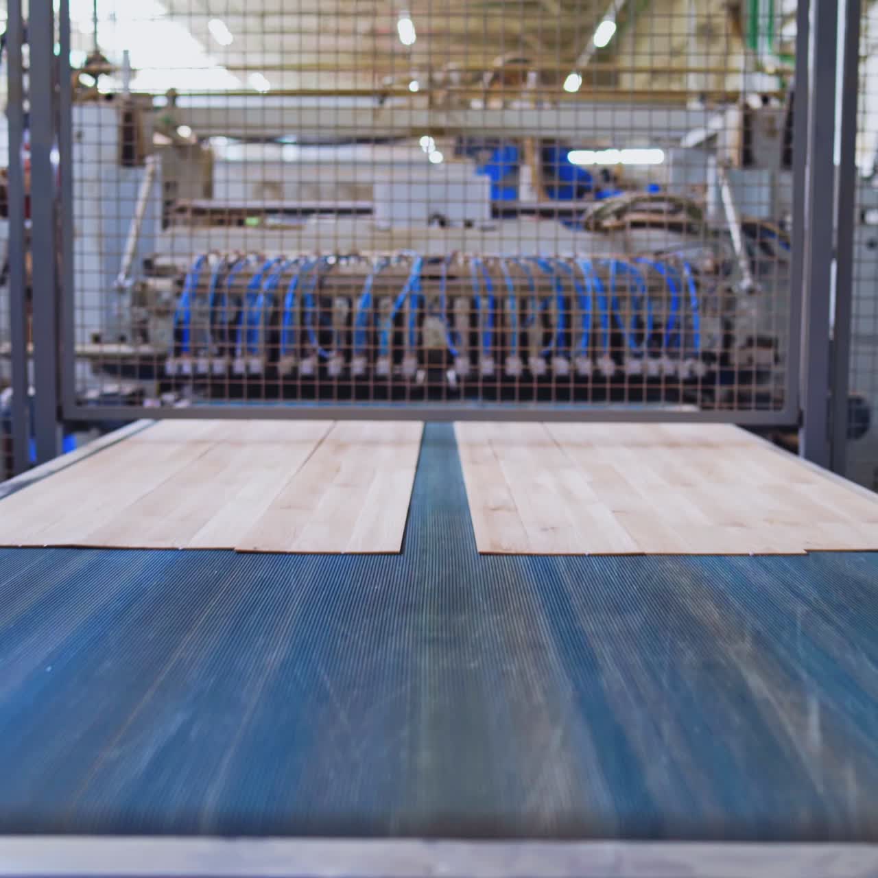 Industrial factory for making parquet. Laminate plant interior. Production of wooden furniture indoors.