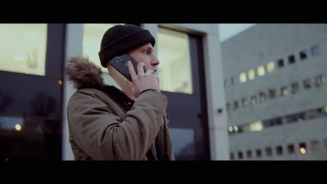 man talking on the phone in the city