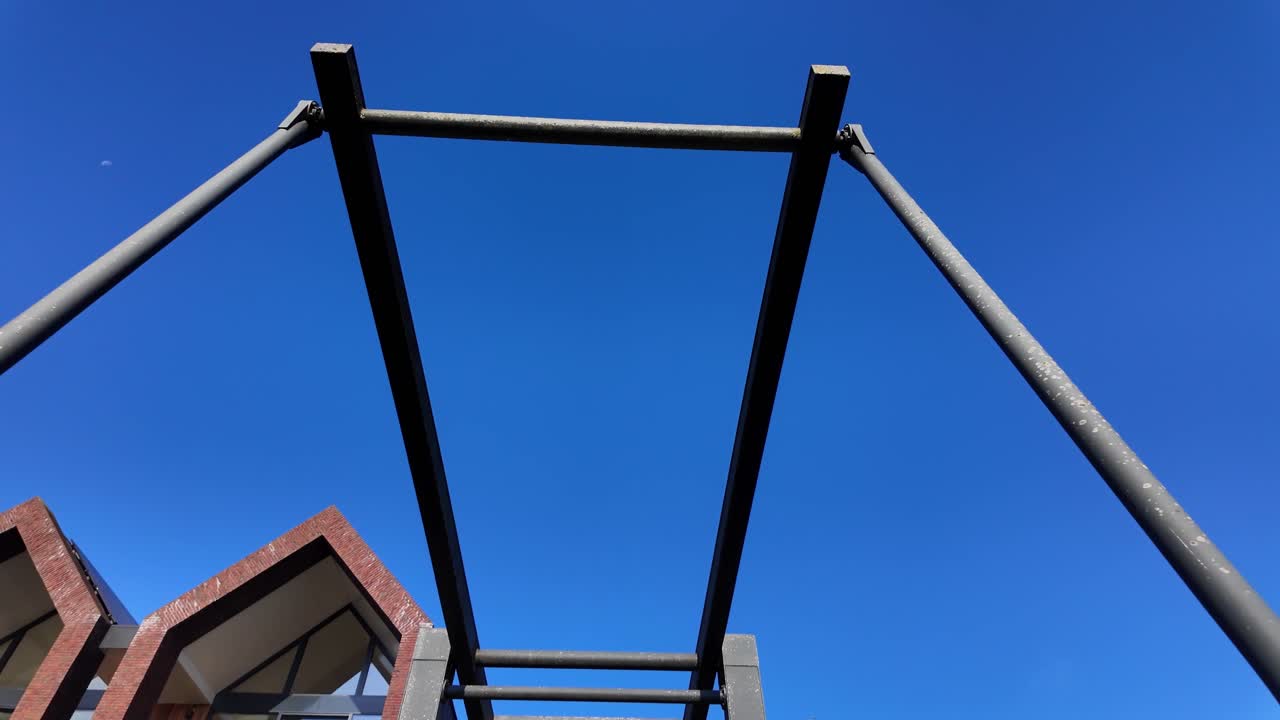 Urban Architecture and Metal Structure under Clear Blue Sky