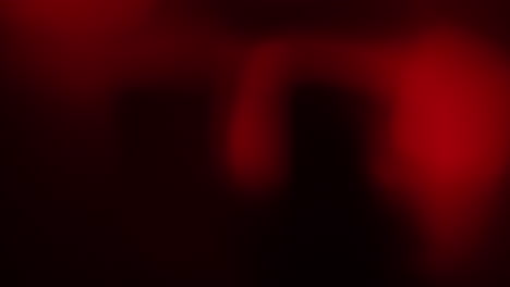 abstract red gases swirl slowly in dark space, resembling plasma or cosmic ether. perfect for vfx, sci-fi overlays, projection art, or experimental film textures with a galactic atmosphere.