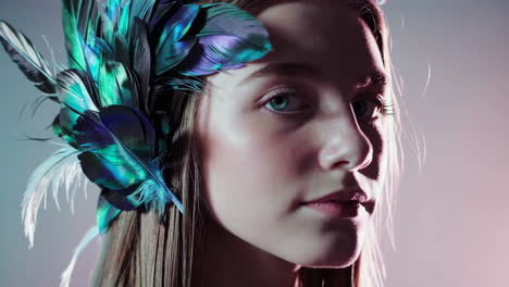 woman with iridescent feather headpiece