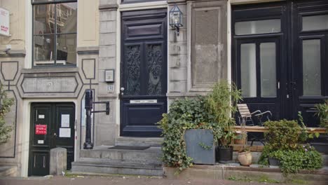 tilt up of beautiful old canal house in amsterdam, the netherlands