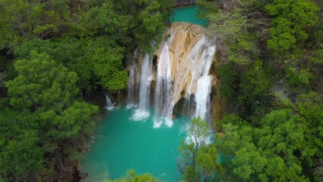 beautiful el chiflon waterfall in tropical mexico jungle, 4k aerial flyover