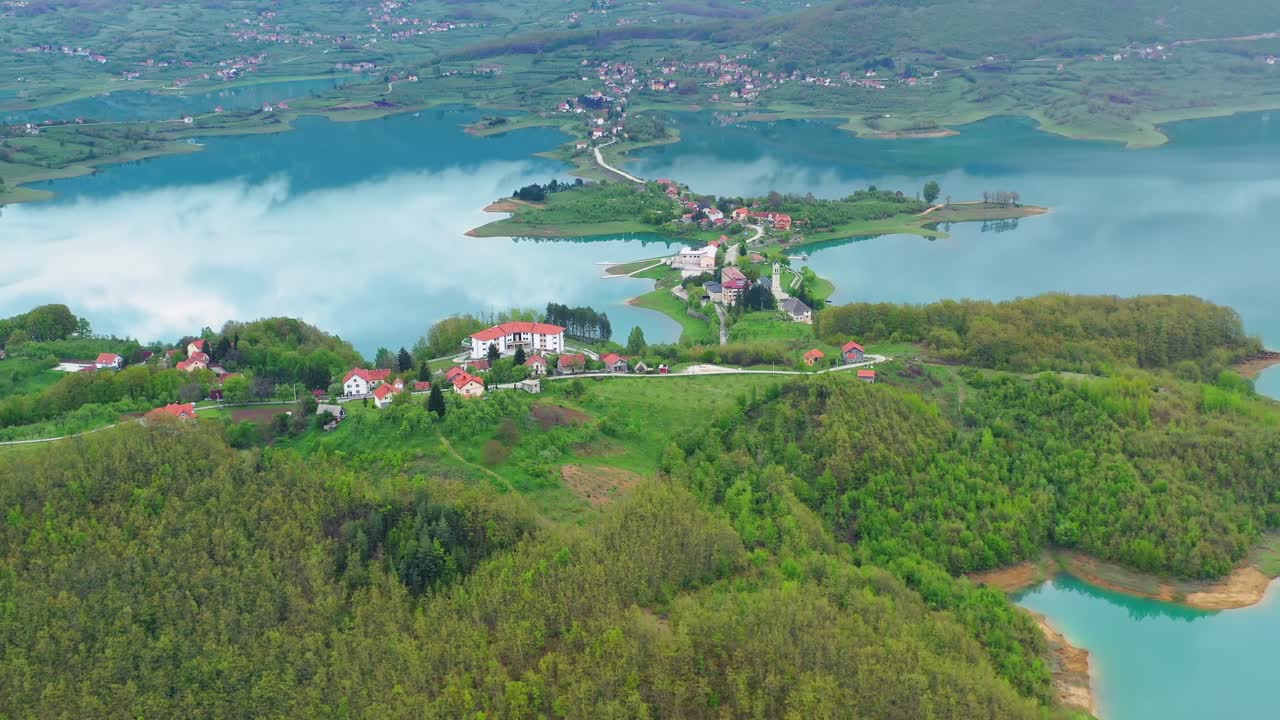 Rama Lake or Ramsko Jezero and lush greenery nature. Aerial wide shot
