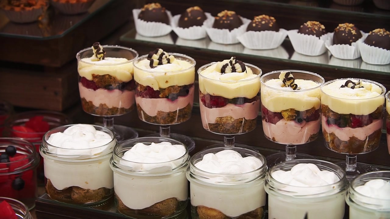 Sweet Buffet with Individual Layered Desserts and Chocolate Truffles