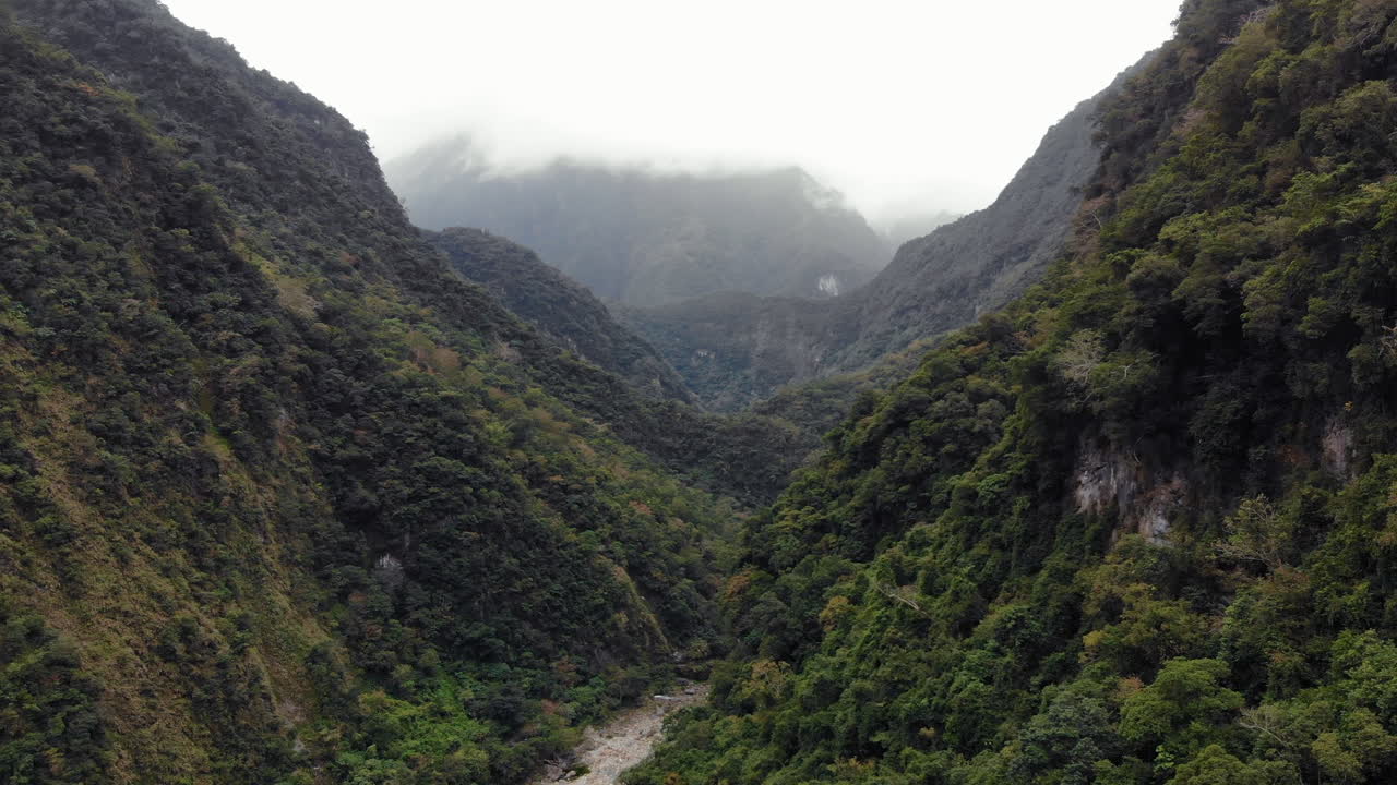 Premium stock video - Aerial drone shot of canyon above shakadang trail ...