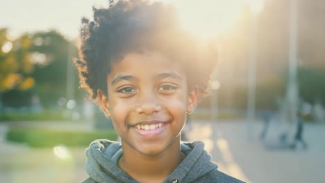 happy young boy smiling for the camera
