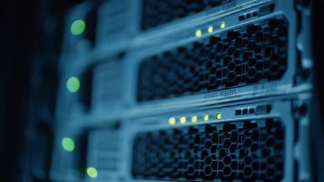 this video showcases the intricate operations of server technology within a data center during nighttime. bright indicator lights illuminate the dark space, revealing the complex machinery at work.