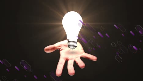 Animation-of-blue-lines-over-lightbulb-and-hand