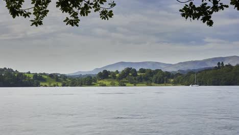 time lapse of the popular tourist desination of windermere lake in the english lake district