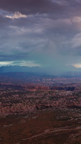 fantastic scenic view of zion national park in utah, usa. cumulus dramatic clouds accumulating over the rocks. aerial view. vertical video