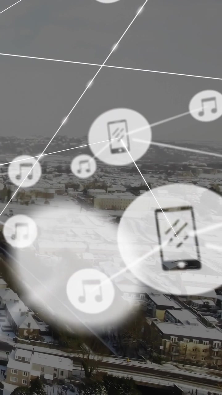 Vertical video: Network entering left, overlaying snowy town, connecting phone and music for tech