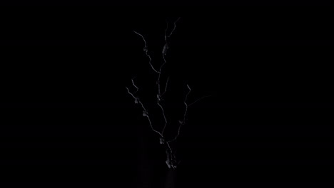 wall surface cracks, breaks and fall apart revealing a black background