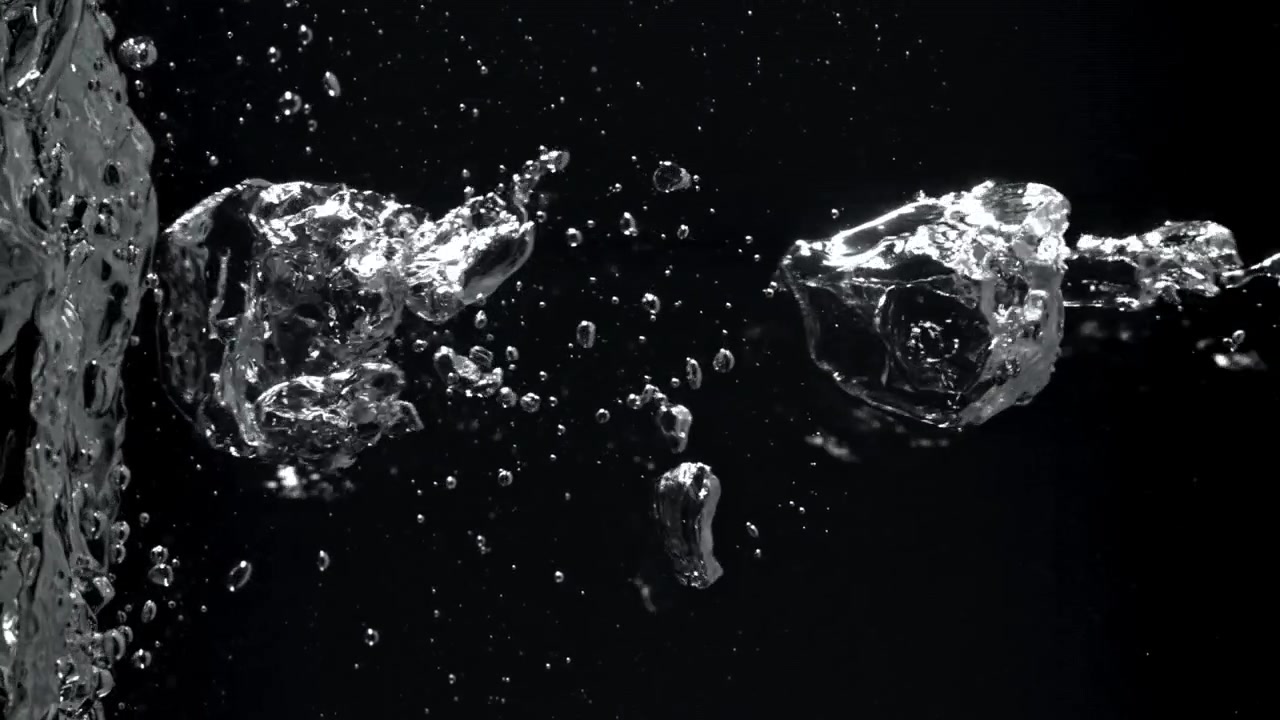 Clear Water Bubbles Rising and Flowing on Black Background