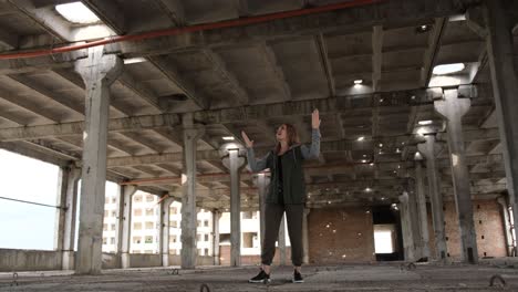 a beautiful woman singing about ukraine in the middle of the ruins of bombed buildings