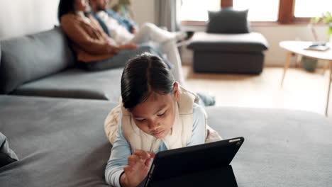 Relax,-tablet-and-child-on-sofa-in-home-living
