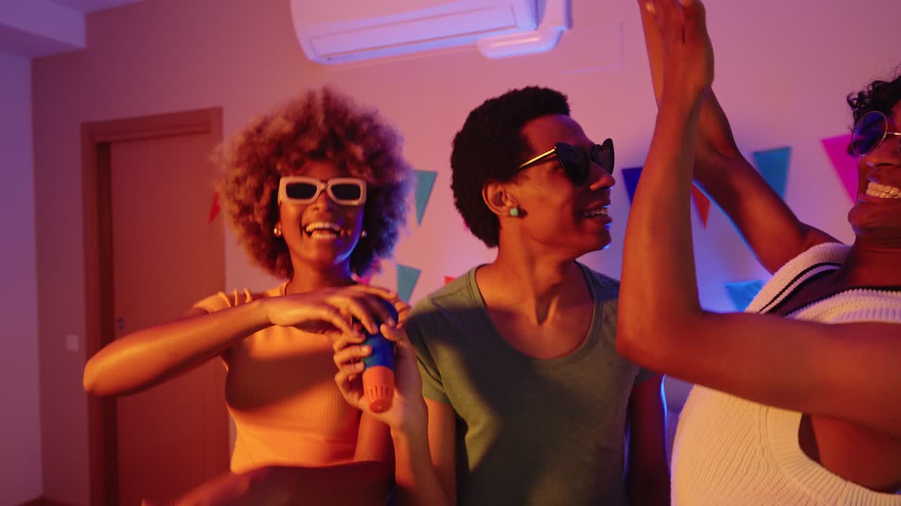 People partying and singing with a microphone