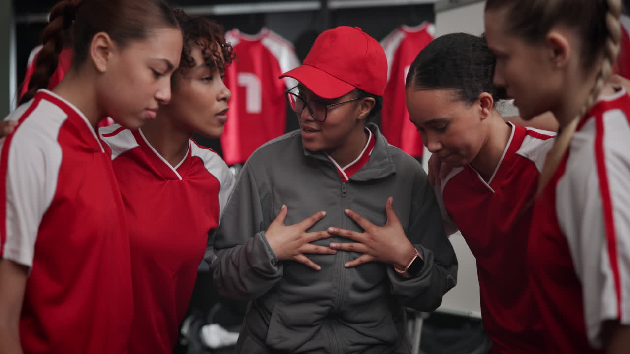 Soccer team gathering in locker room