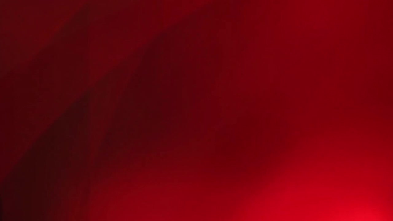Fughe di luce rosse astratte e transizioni morbide
