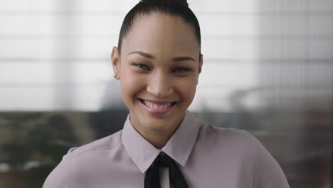 portrait of beautiful young mixed race business woman intern smiling happy looking at camera enjoying corporate job opportunity