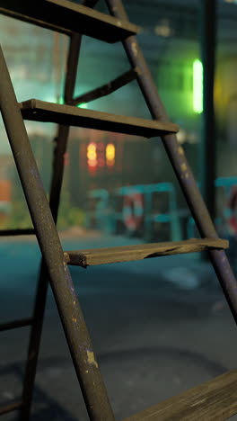 old wooden and metal ladder at night