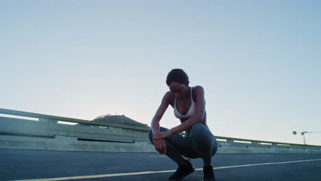 Black-woman,-runner-and-fitness-rest-in-city-road