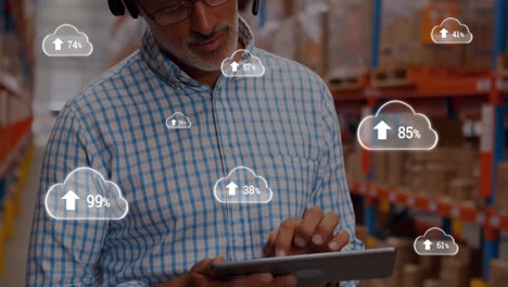 animation of  man working in a warehouse and using a tablet with cloud icons