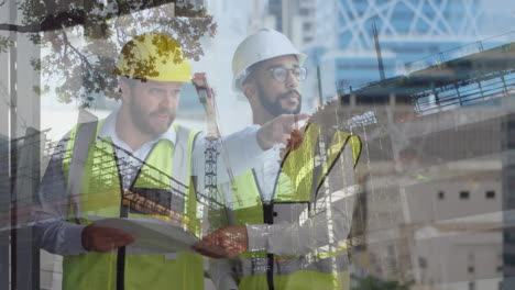 trabajadores de la construcción con planos