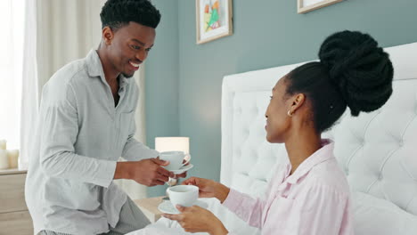 African-couple-drink-coffee-in-bed