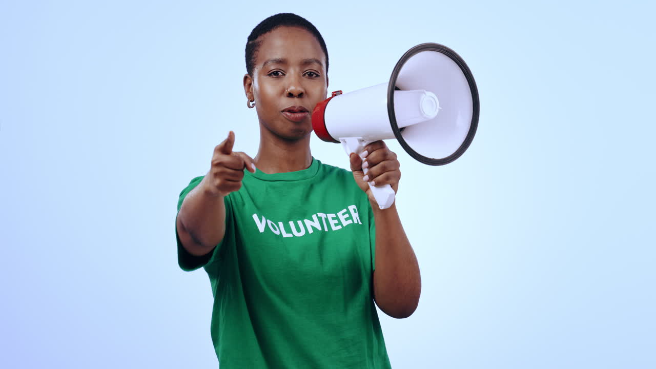 Woman, volunteer and megaphone for protest